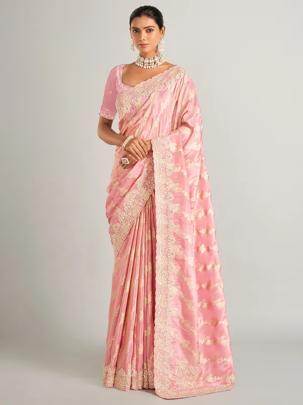 Glowing light pink zari worked saree in silk