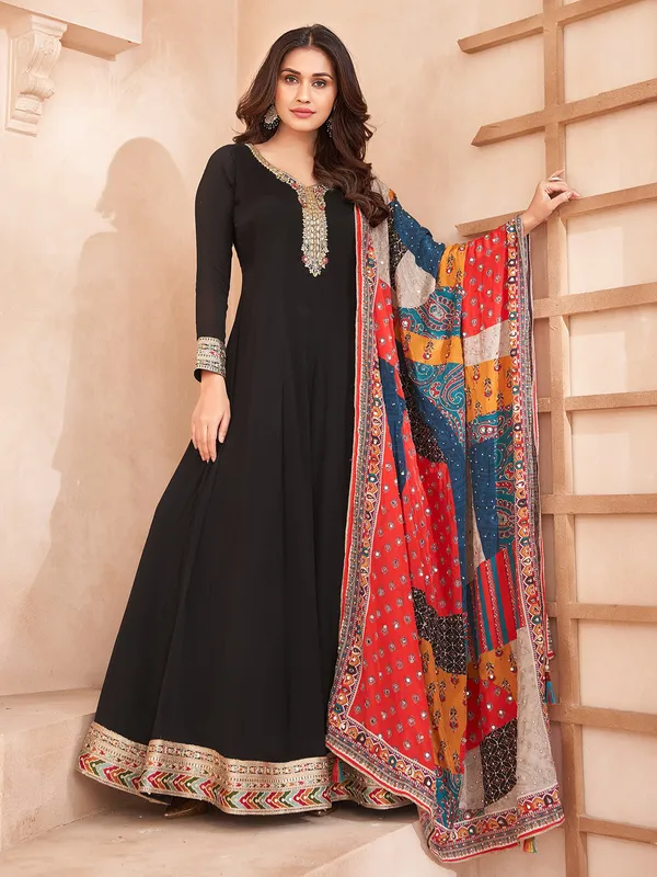 Festive black silk floor length suit with dupatta